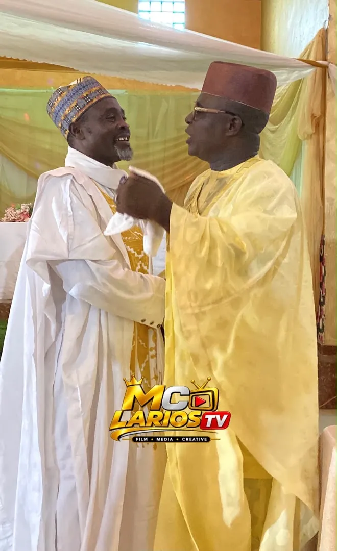 Two men embracing in greeting